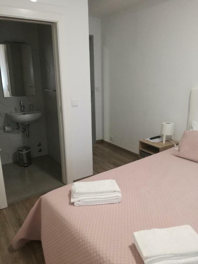 Baixinho Guest House วีลาปรายา เด อันโกรา ภายนอก รูปภาพ